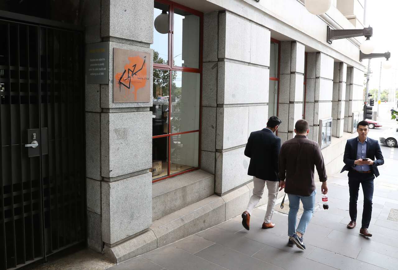 People walk past the entrance to Melbourne's Gazi restaurant, one establishment in the chain of venues now facing an uncertain future.