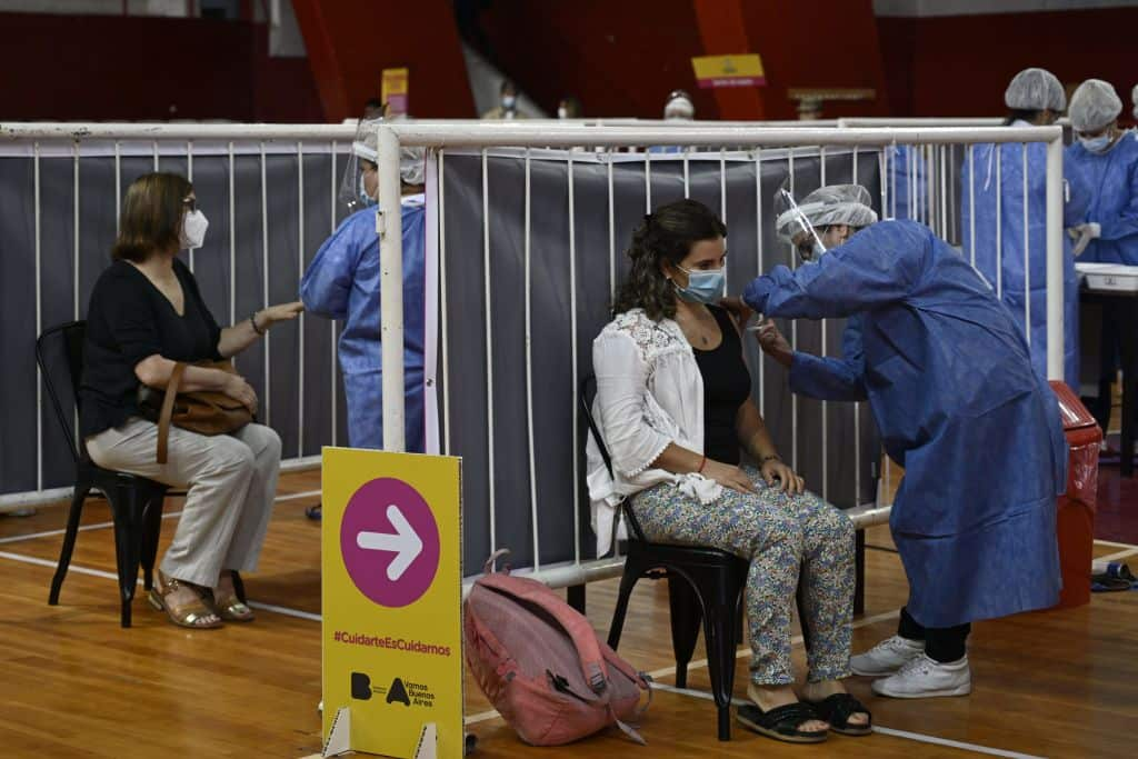 Health workers getting against COVID-19 with the Sputnik V vaccine in Buenos Aires on 2 February 2021.