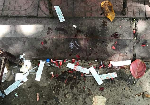 Syringes, cotton balls and dozens of vocal cords were disposed on the floor after operations