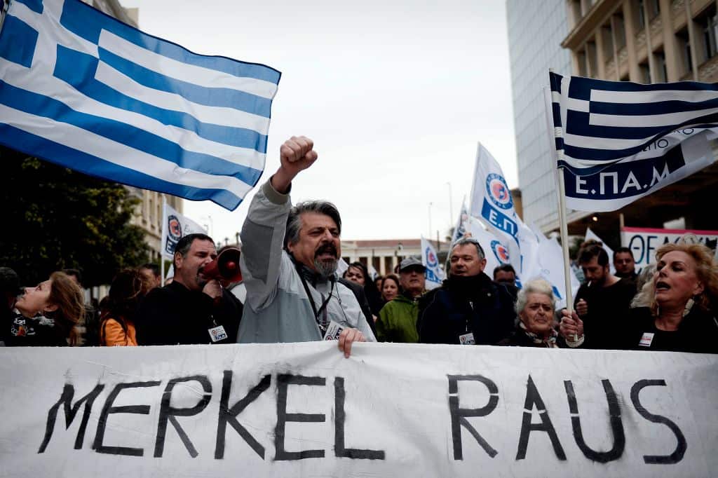 Greeks chant slogans during a demonstration against the visit of the German Chancellor in Athens in 2014. 