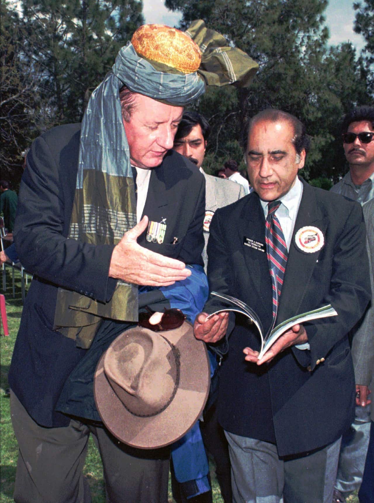 Tim Fischer, left, in Peshawar, 200 kilometeres west of Islamabad.