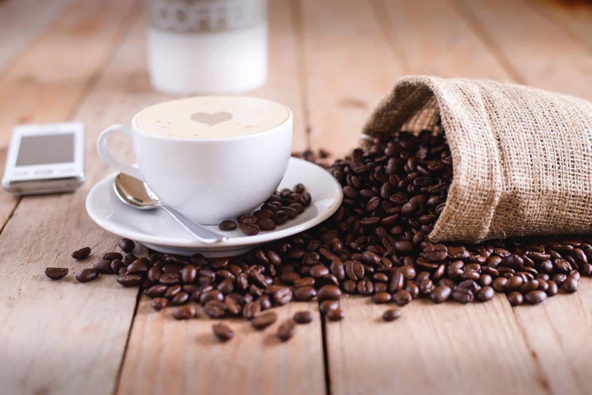 Coffee beans and cup