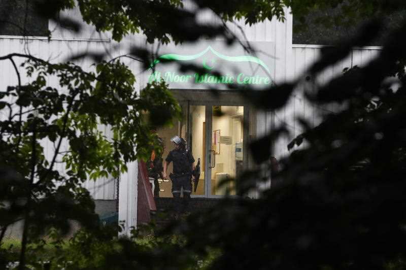 Police on a site of a shooting inside the al-Noor Islamic center mosque in Baerum outside Oslo, Norway, 10 August 2019