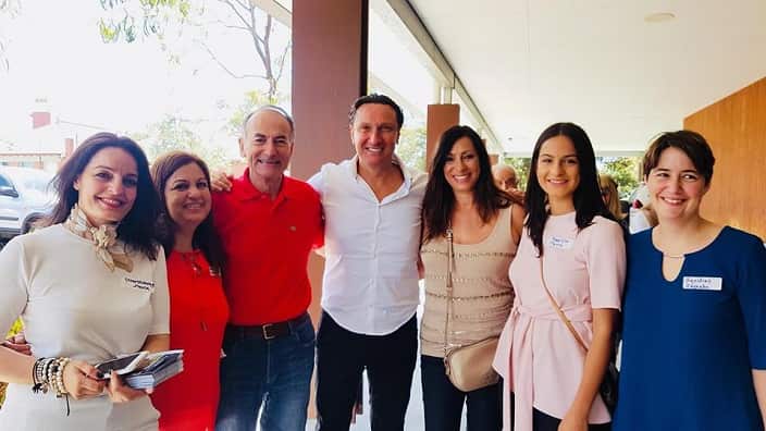 Bill Papastergiadis (centre) with candidates for the Greek Community of Melbourne's Board on the day of the election (20 January).