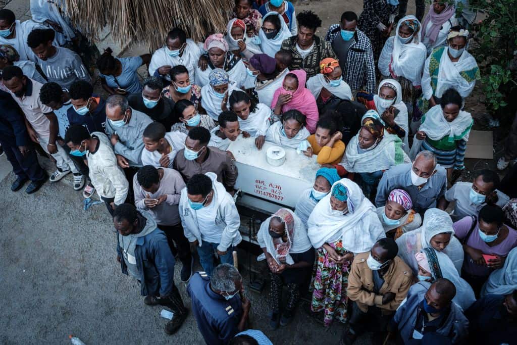 Relatives wait for the arrival of amburances outside the Ayder referral hospital in Mekele, the capital of Tigray region, Ethiopia, on 23 June, 2021.