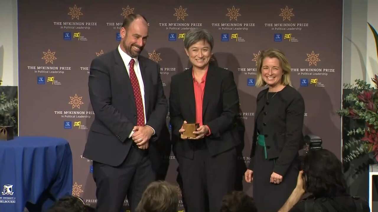 Penny Wong accepts the award.