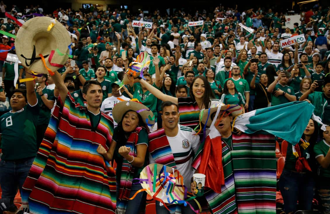 Fans of Mexico cheer for their team during an international friendly football match between Mexico and Scotland.