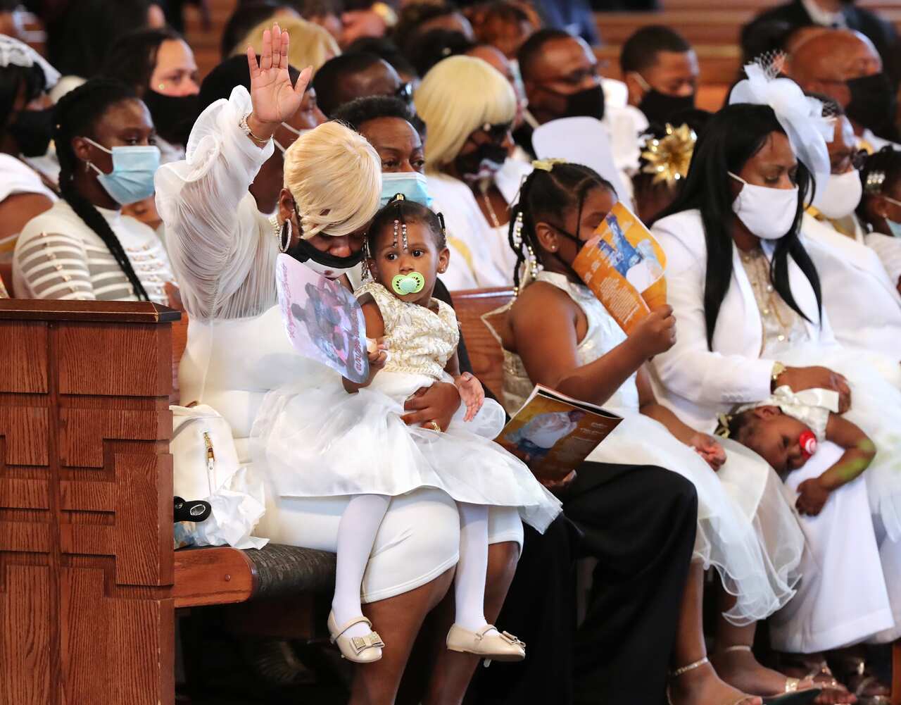 Tomika Miller, the widow of Rayshard Brooks, and their three daughters.