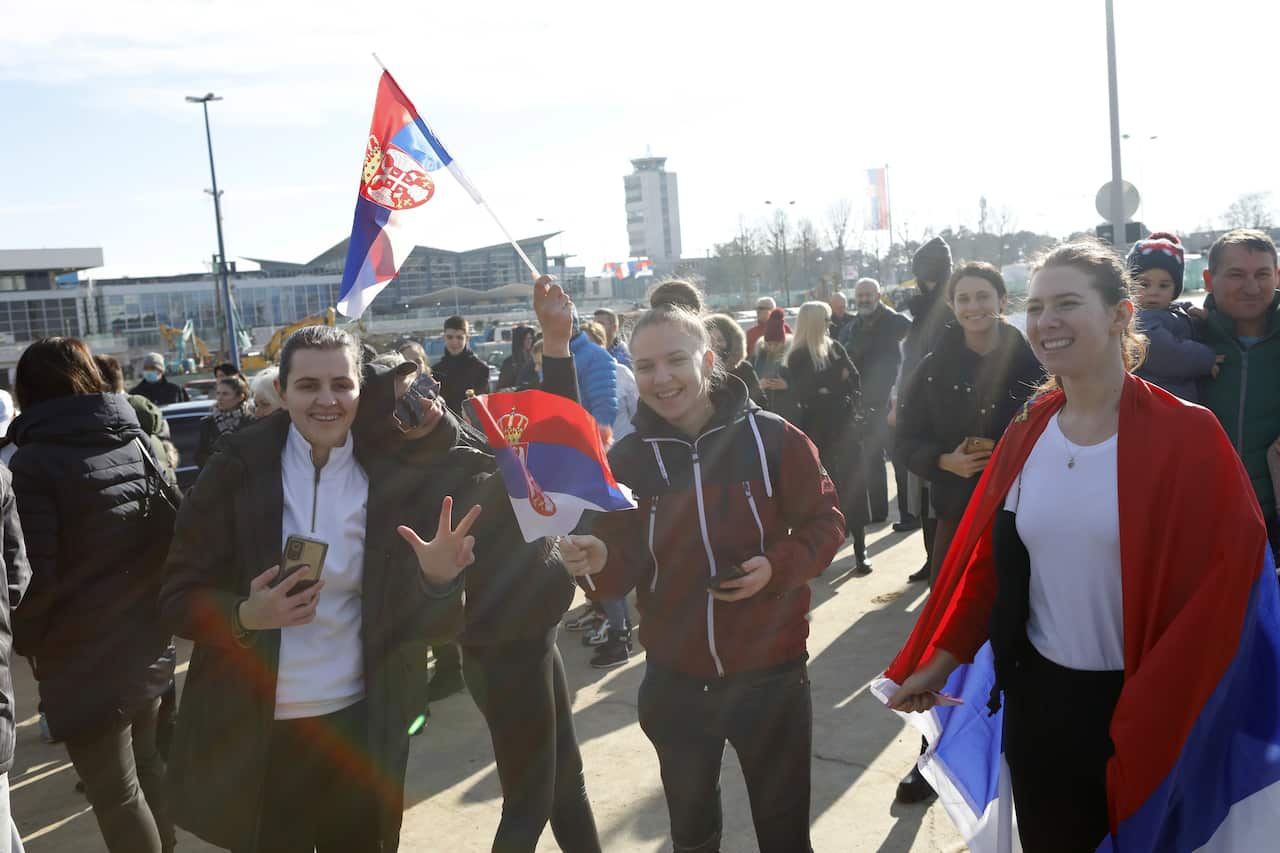 Supporters of Serbian tennis player Novak Djokovic gather at the Nikola Tesla Airport in Belgrade, Serbia, 17 January 2022.