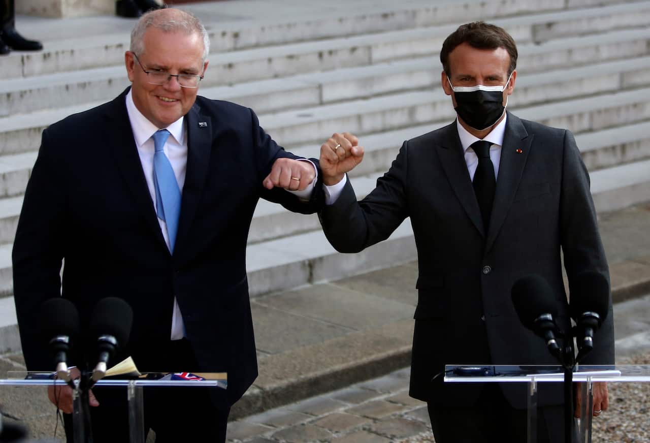 French President Emmanuel Macron, right, and Prime Minister Scott Morrison at a joint press conference before a working dinner in Paris, June 15, 2021.