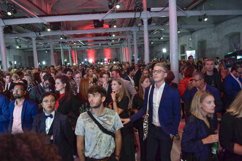 People watch and react at the Social Democratic Party's election party in Stockholm.