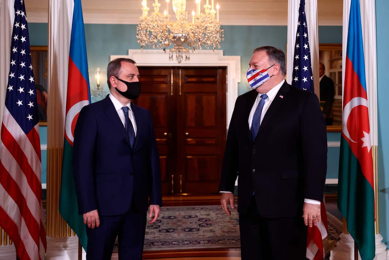 Secretary of State Mike Pompeo walks out to face reporters with Armenia's Foreign Minister Zohrab Mnatsakanyan, prior to holding talks, Friday, Oct. 23, 2020 at the State Department in Washington. (Hannah McKay/Poolvia AP)