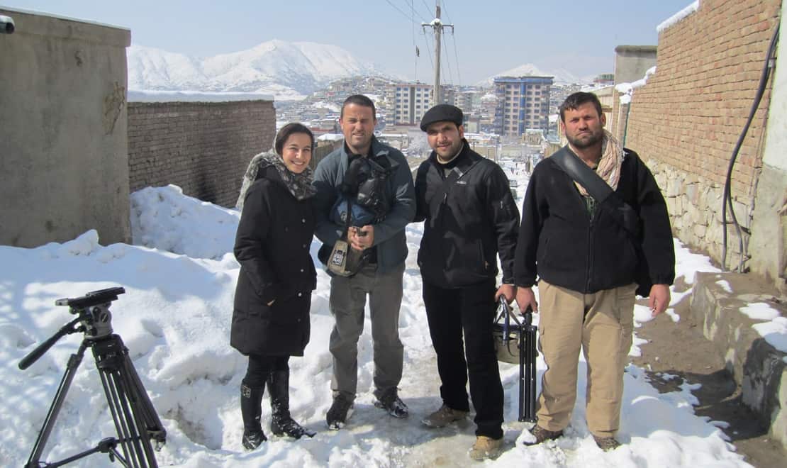 Yalda Hakim and the Dateline team in Afghanistan, interviewing President Hamid Karzai and filming on the streets of a snowy Kabul.