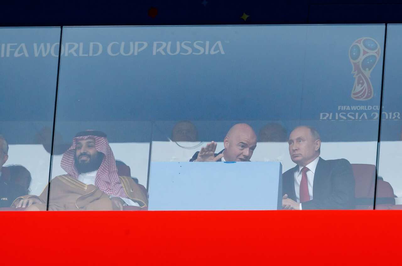 Mohammed bin Salman of Saudi Arabia, FIFA President Gianni Infantino and President Wladimir Putin of Russia look on