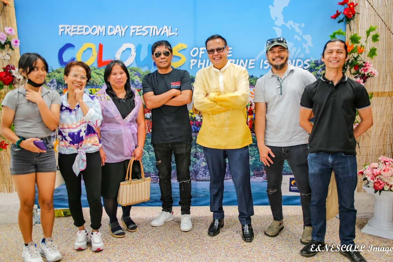 Ness Gavanzo (in purple) with FCCVI President Marlon De Leon (in yellow) and other attendees of Freedom Day Festival
