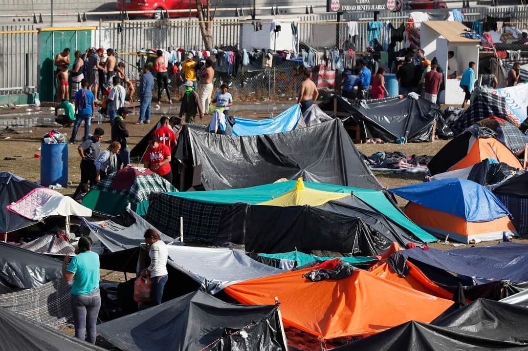 Migrants from Central America sleep in tents in Tijuana, Mexico, near the border with the United States.