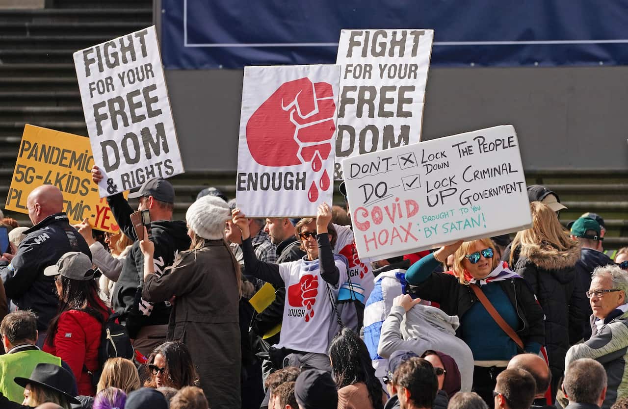 About 100 people in Melbourne protested lockdowns, vaccinations and 5G over the weekend against what they called the "coronavirus conspiracy".