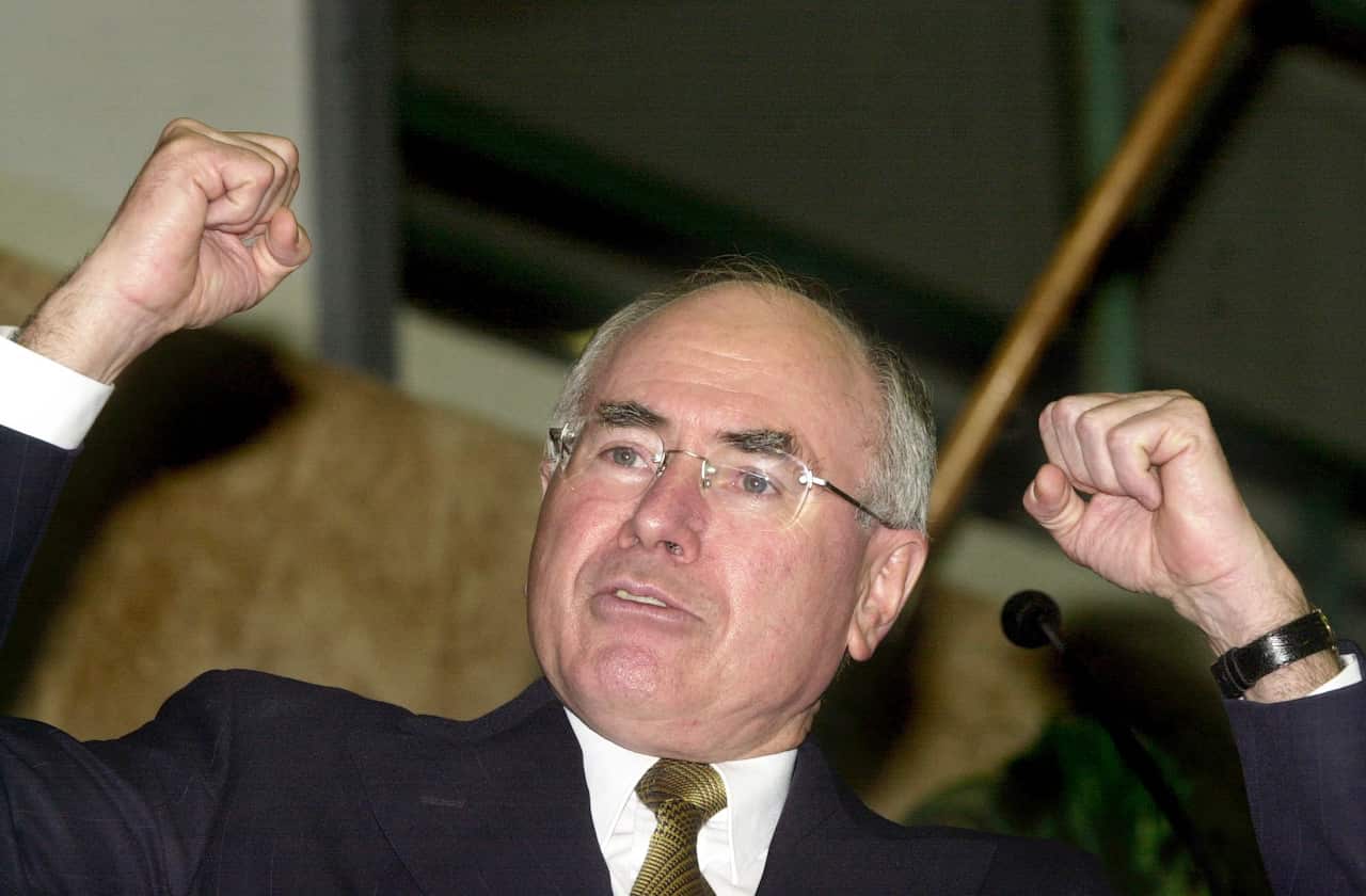 Prime Minister John Howard rejoices in the glory of favourable opinion polls following the Tampa refugee crisis. 