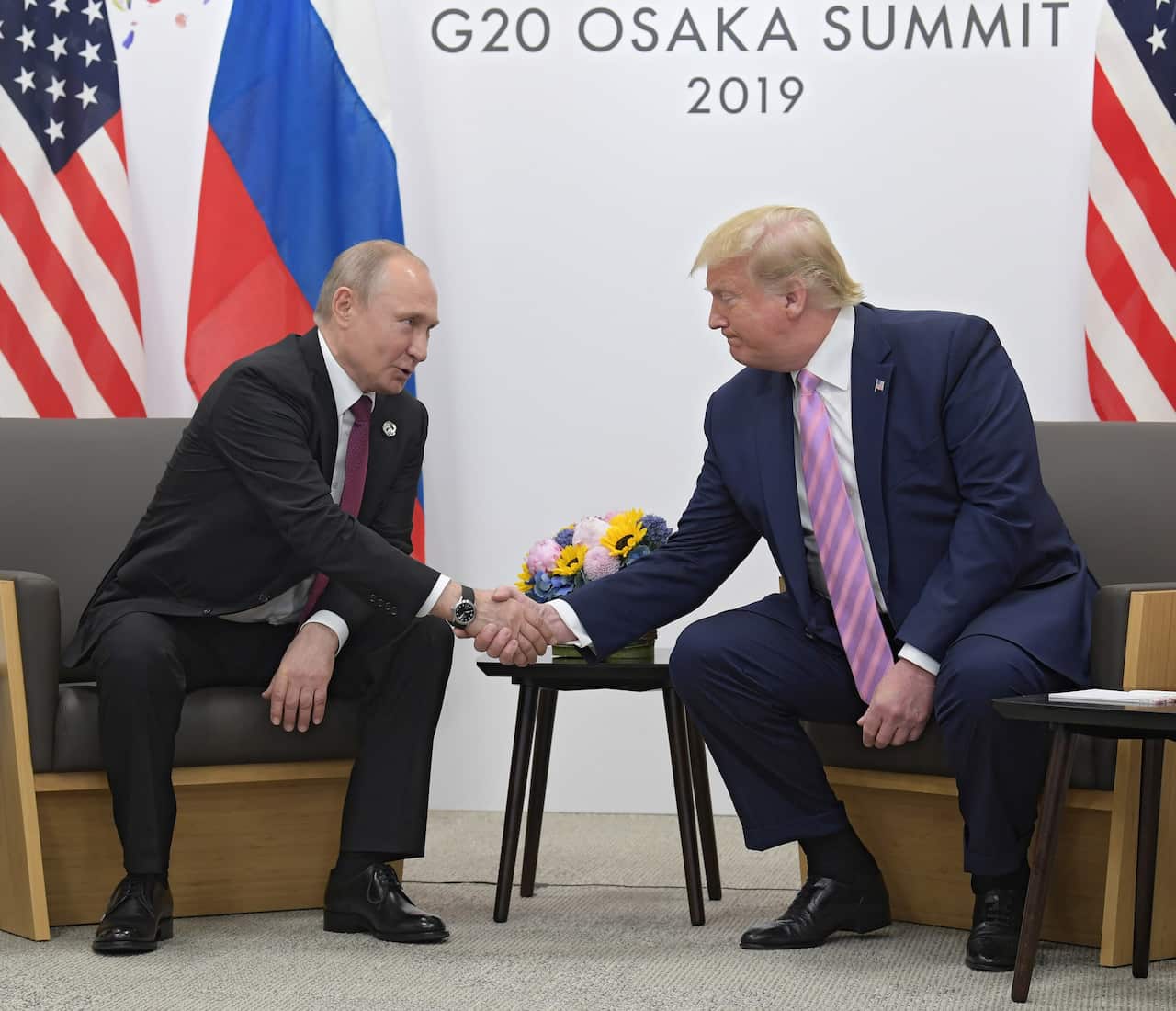 Russian President Vladimir Putin and US President Donald Trump during this year's G20 Summit in Japan.
