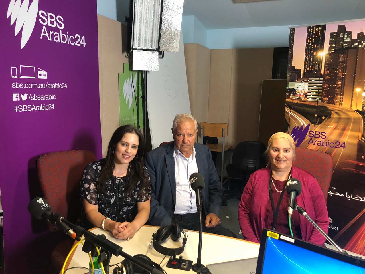 Amal Awad and her parents