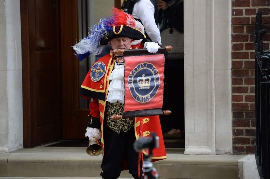 A town crier outside the Lindo Wing at St Mary's Hospital in Paddington, London, after the news that the Duchess of Cambridge has given birth.