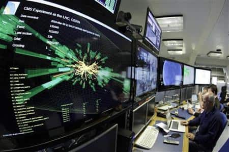 A graphic showing a collision at full power is pictured at the CMS experience control room of the LHC at the CERN in Meyrin