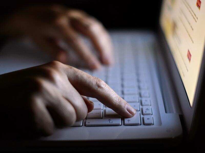 File photo of a woman using a laptop.