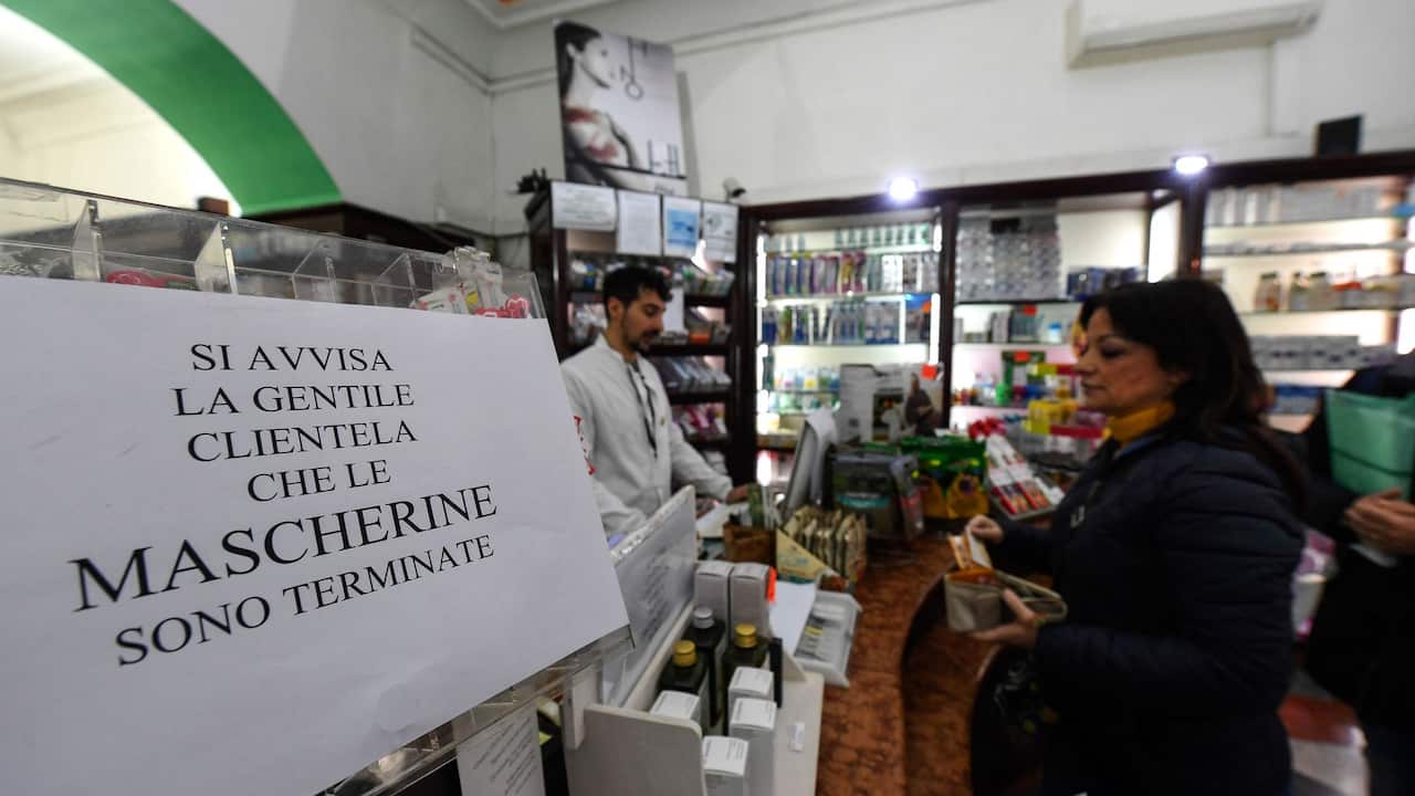 Customers are warned of the end of protective masks and to stay at a safe distance from the counter to avoid any contagions. Naples, Italy, on February 24, 2020