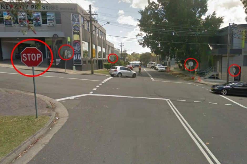 This junction has eight stop signs, but we could only fit five in the photo.