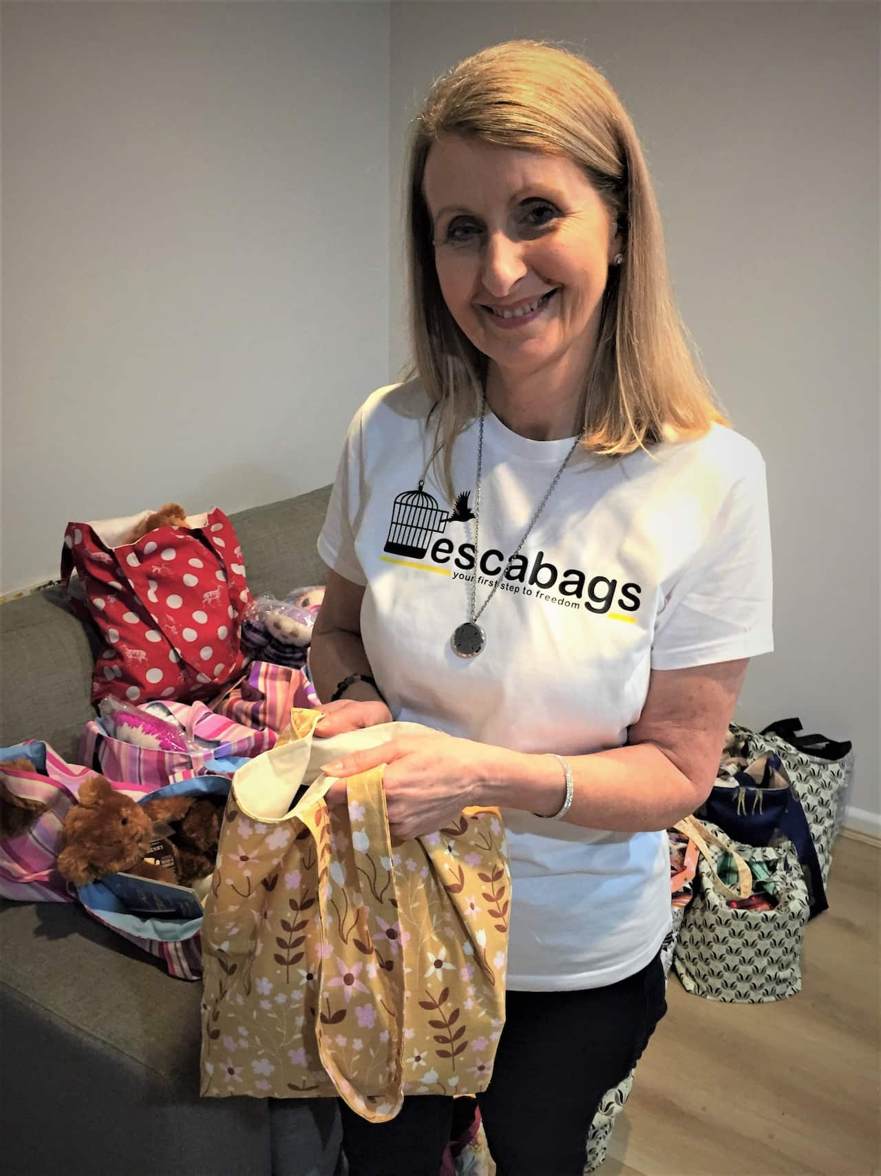 Marie Copp with one of the hand made bags.