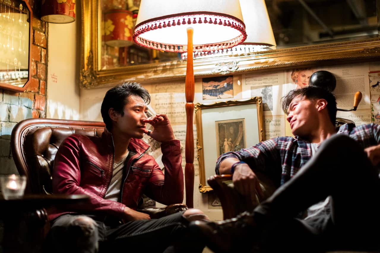 Chris Pang, right, and John Harlan Kim, who had a four-season stint on The Librarians, at a bar in Melbourne, Australia.