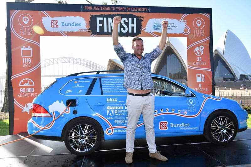Dutchman ends 'world's longest electric car trip' in Australia SBS
