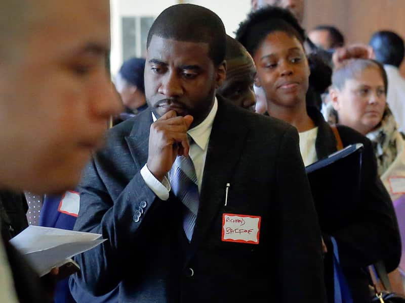 Job seekers attend a job fair in New York