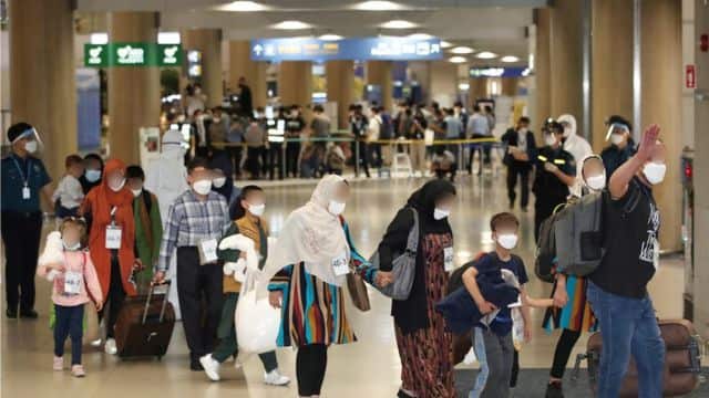 Afghans arrive at Incheon international airport
