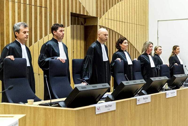 Judges at the start of the trial of four men charged with murder over the downing of Malaysia Airlines Flight 17