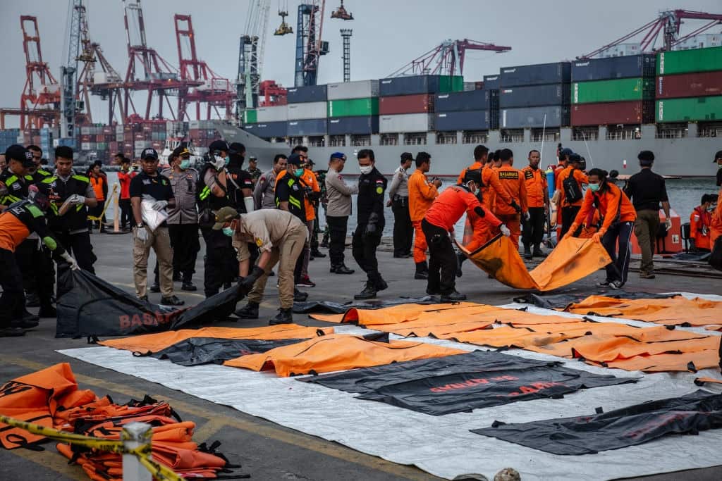 ody bags containing remains of passengers from Lion Air flight JT 610 are laid out at the Tanjung Priok port on November 4, 2018 in Jakarta.