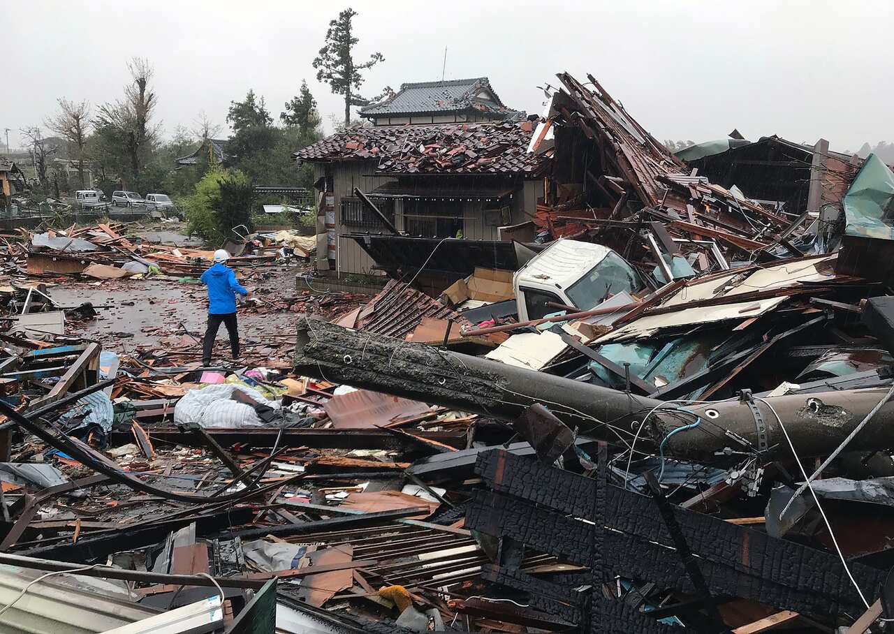 Damaged houses caused by weather patterns from Typhoon Hagibis are seen in Ichihara, Chiba.