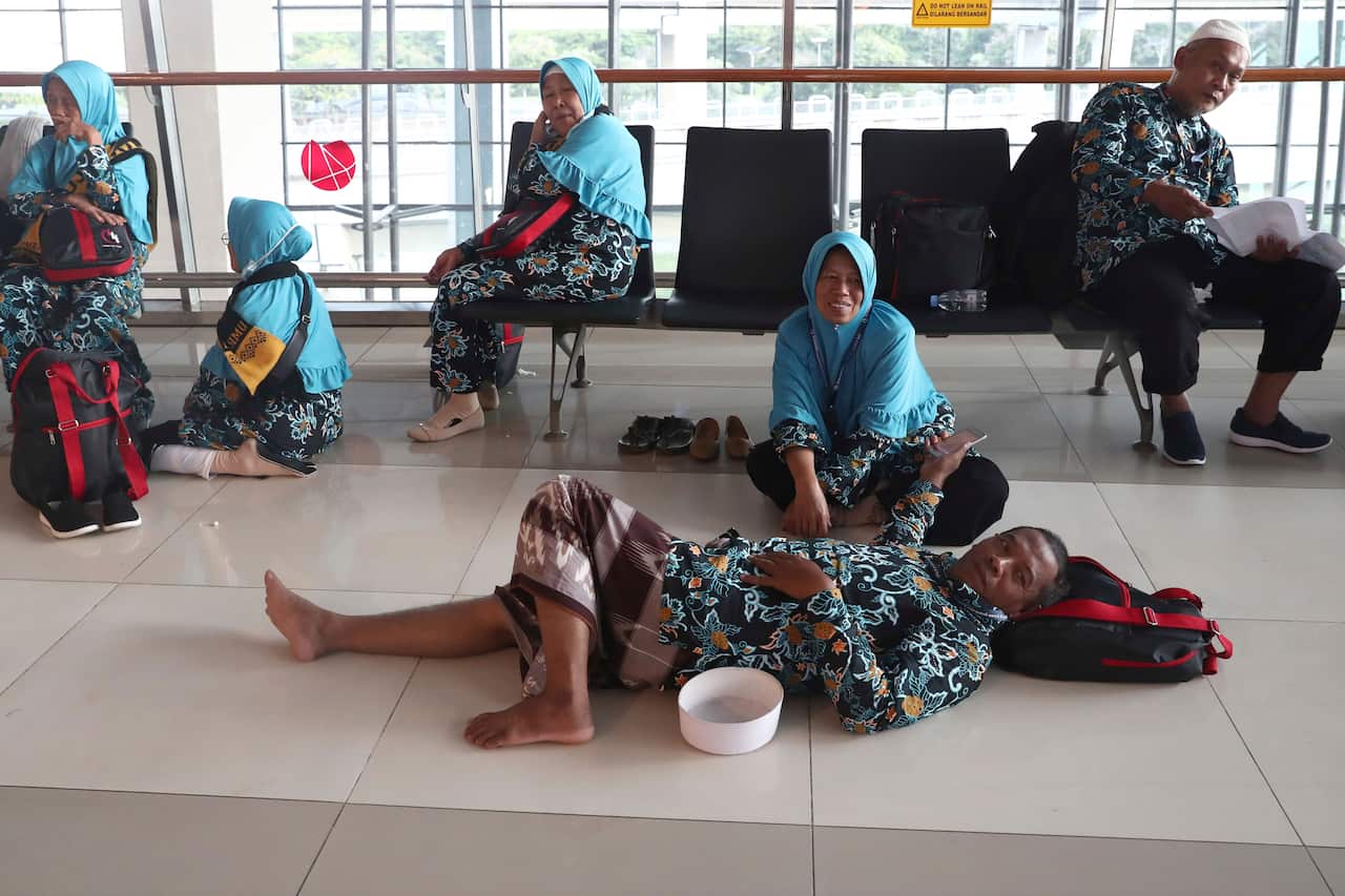 Indonesian scheduled to travel to Saudi Arabia for Umrah rest as they are turned away from their flights at Soekarno-Hatta International Airport.