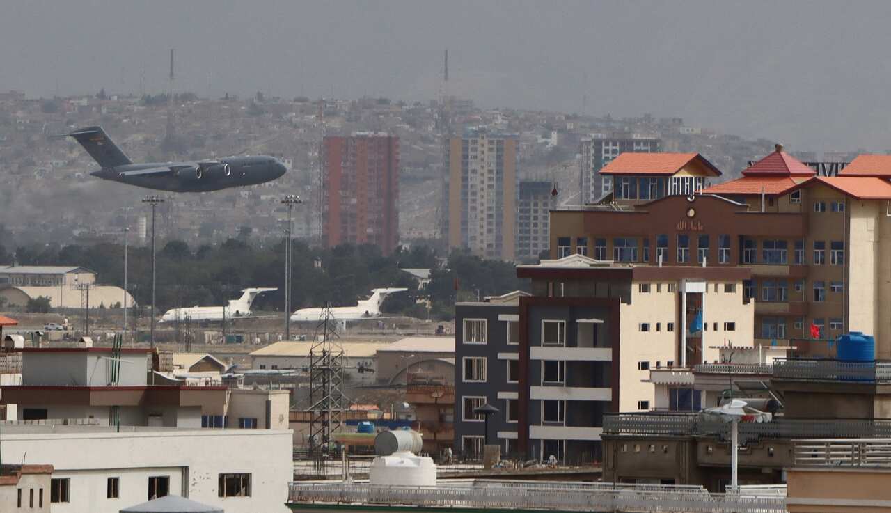 A Military aircraft takes off at the Hamid Karzai International Airport in Kabul, Afghanistan, 30 August 2021.