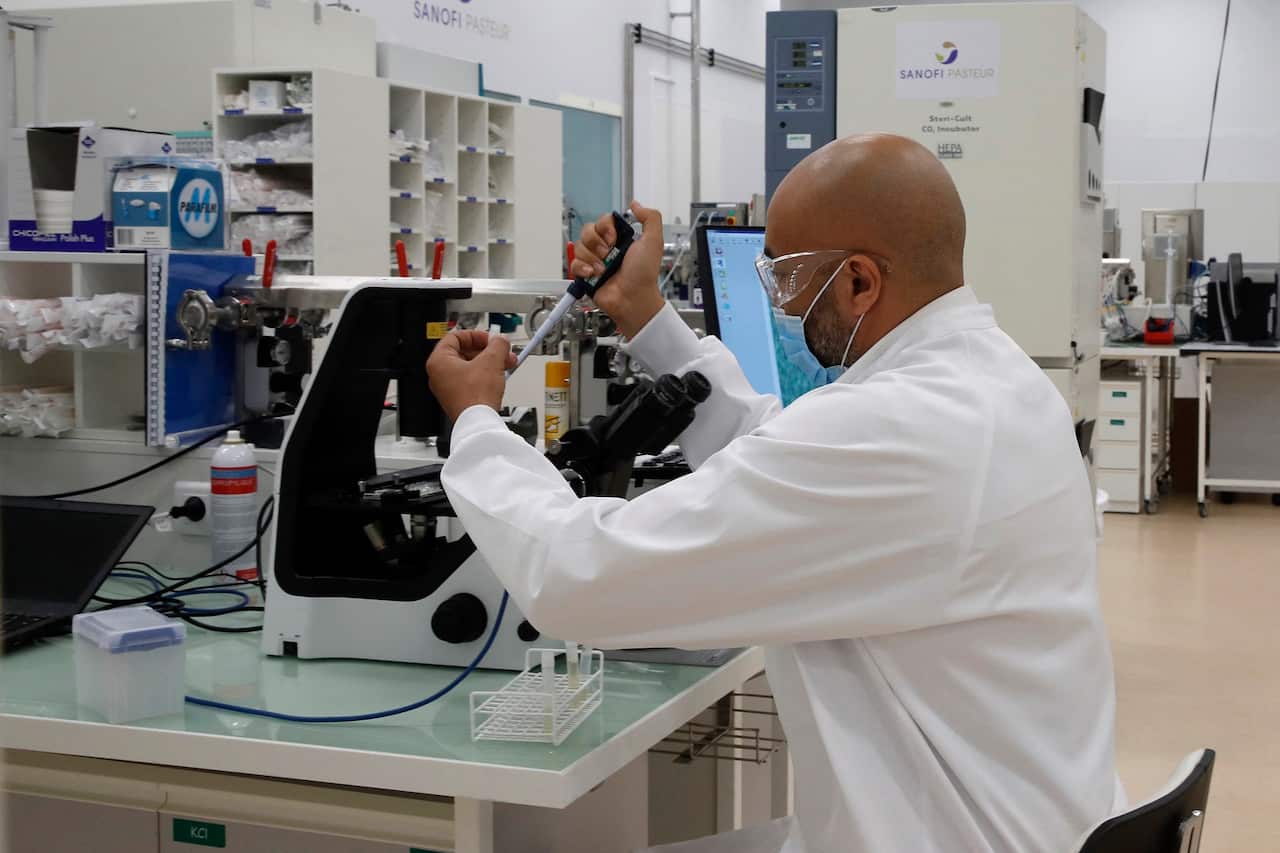 A researcher works in an industrial development laboratory 