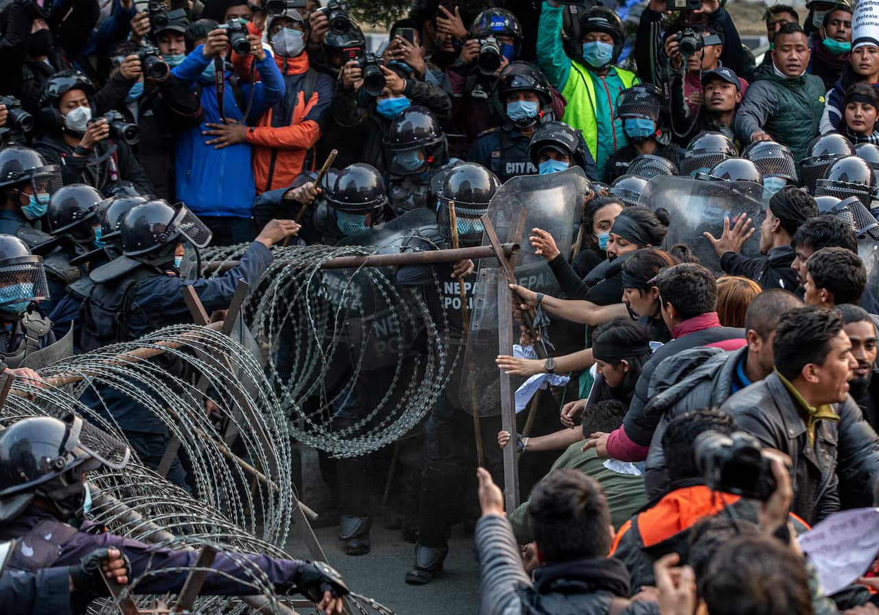 Activists from Nepal's Communist Party clash with police during the protest against the arrest of their leader Ram Kumari Jhakri, KathmanduEPA/NARENDRA SHRESTHA