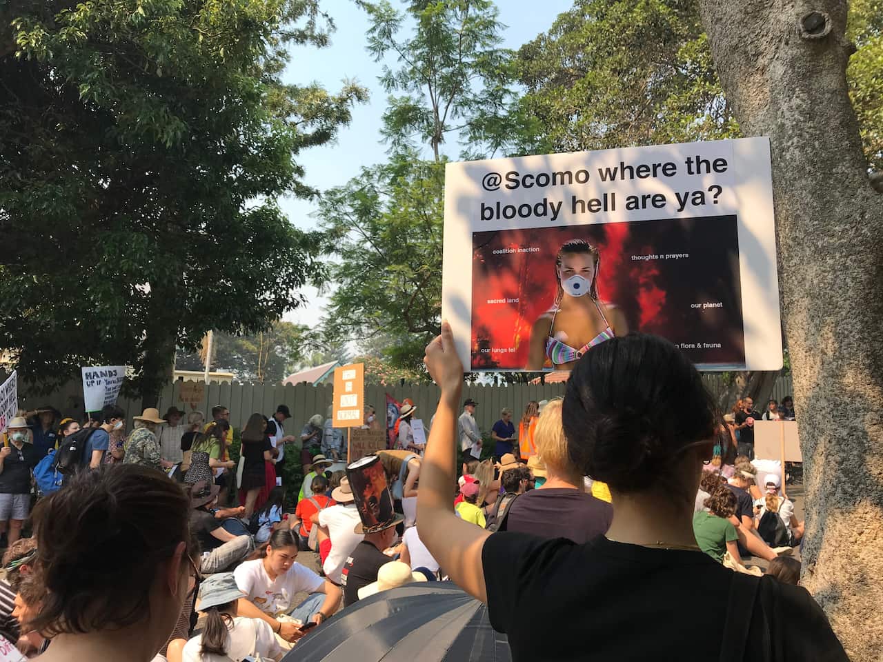 Protesters say the prime minister's holiday is badly timed.
