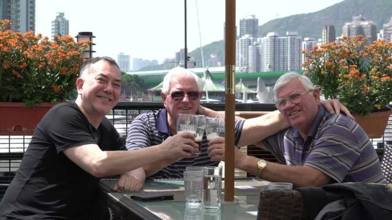 Anthony Wong with his 2 twin brothers