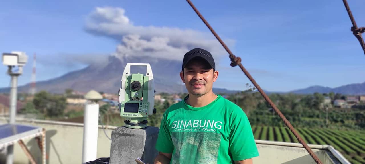 Volcano watcher, Armen Putra keeping an eye on volcano Mount Sinabung.Sinabung  