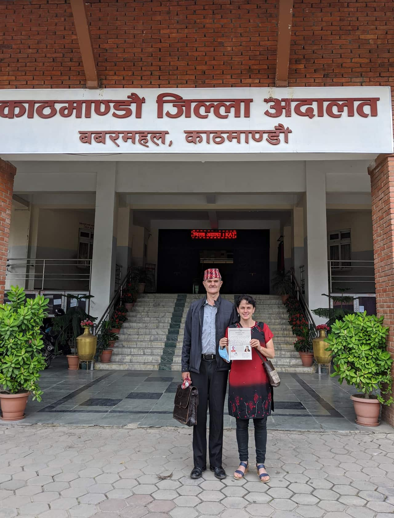 Australian Ian Poole and Tara Linhardt after getting their marriage registered at Kathmandu District court in Nepal.