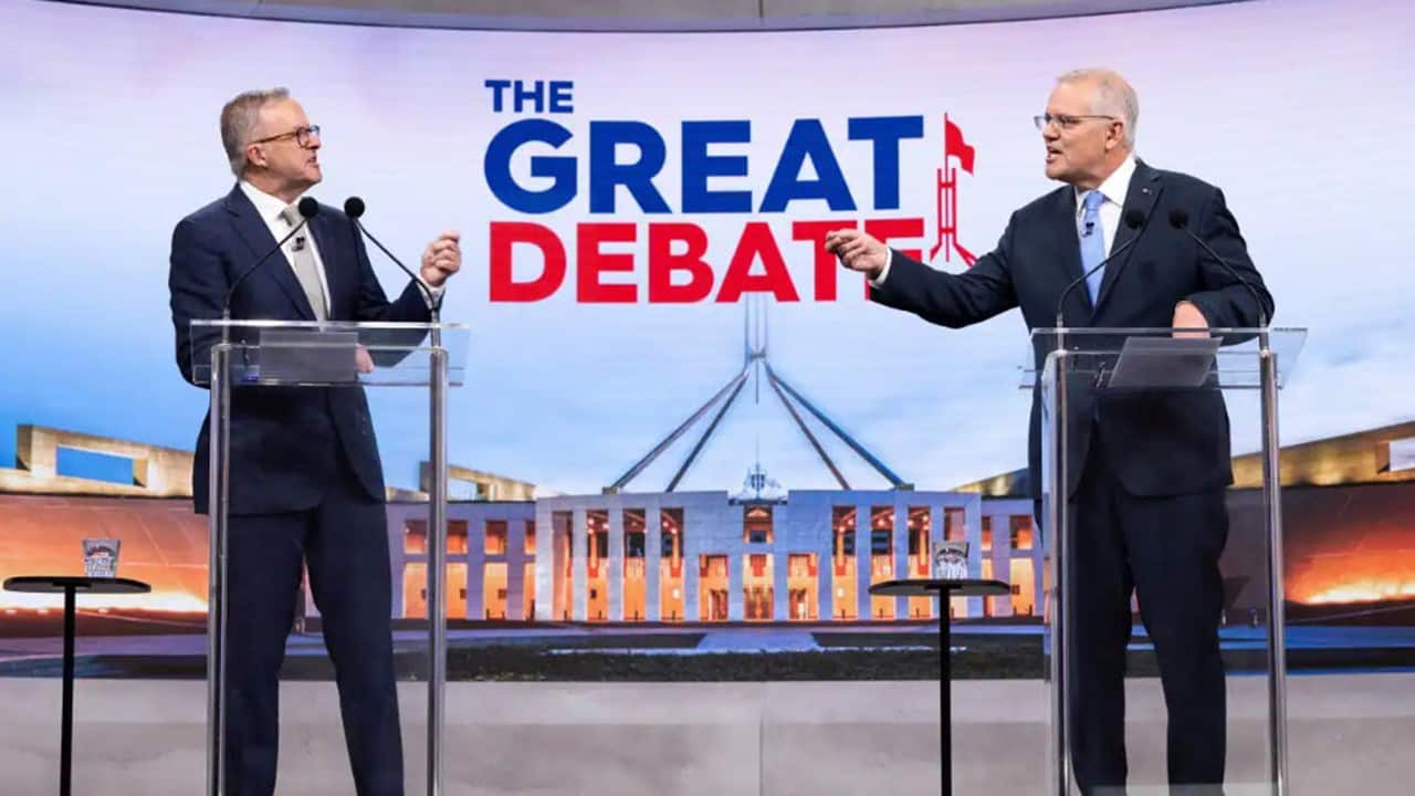 Australian Prime Minister Scott Morrison (right) and Opposition Leader Anthony Albanese during the second leaders' debate in Sydney, Sunday, 8 May, 2022.