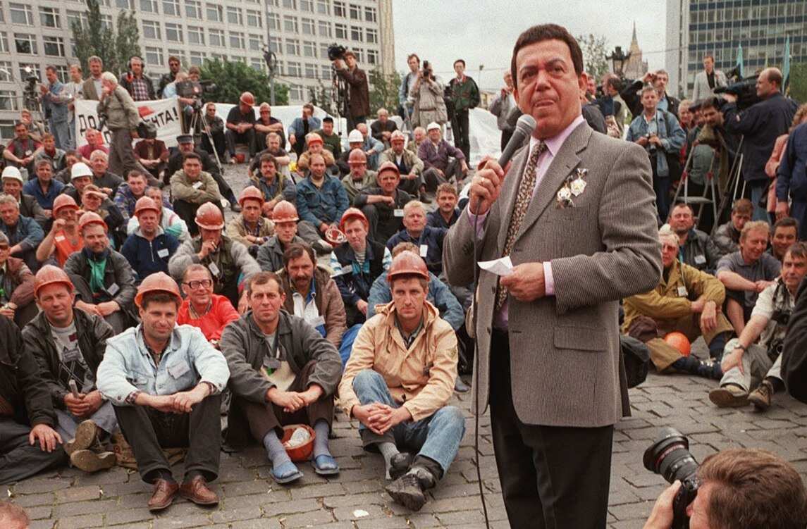 Member of the Parliament singer Iosif Kobzon sings during a free concert for the miners outside Russia's government building in Moscow, Friday, June 26, 1998. 