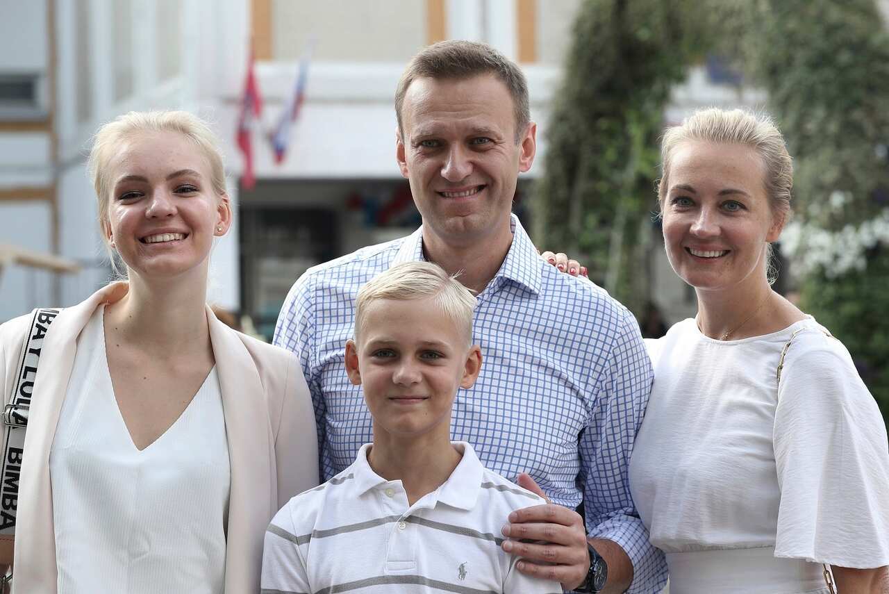 A file photo of Alexei Navalny, with his wife Yulia, daughter Daria, and son Zakhar