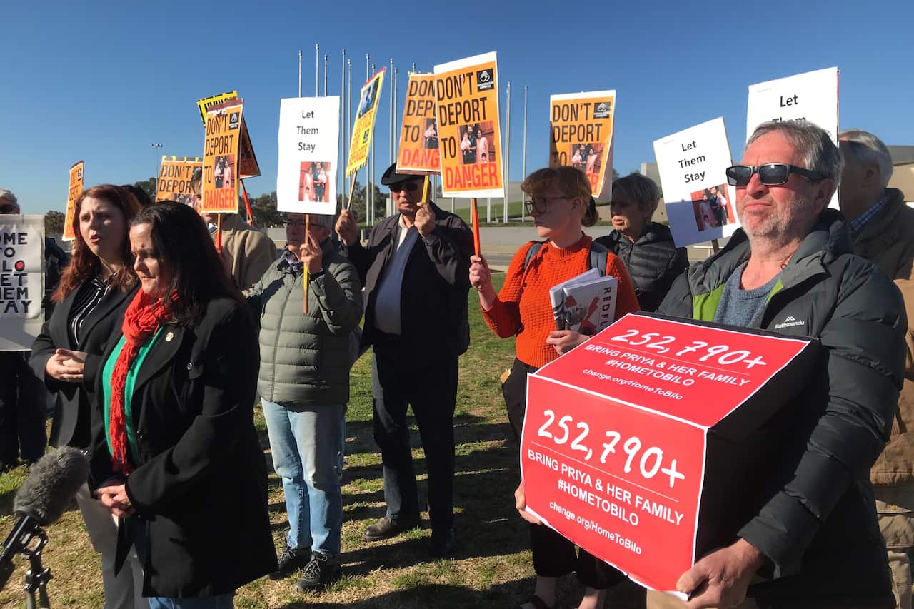 Supporters of the Biloela Tamil family arrive to deliver a petition to Prime Minister Scott Morrison at Parliament House  in Canberra, Wednesday, September 11, 2019. (AAP Image/Mick Tsikas) NO ARCHIVING