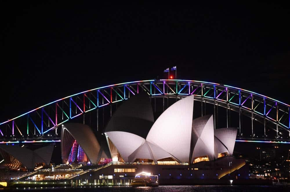 The Sydney Harbour Bridge is lit in rainbow colours